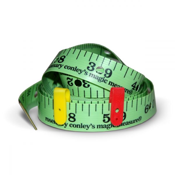 A Magic Measure tape measure coiled up with tags attached
