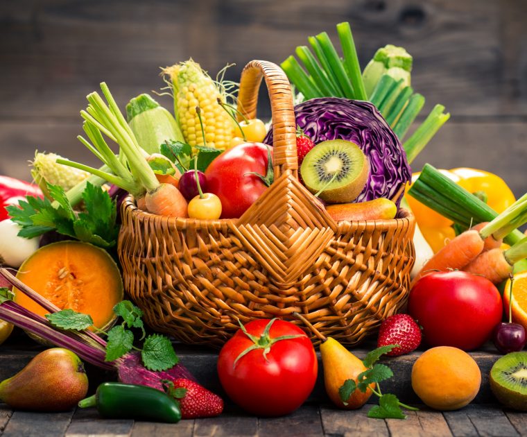 Colourful Fresh fruits and vegetables in a wicker basket. If you are looking to lose weight, eat more healthily.