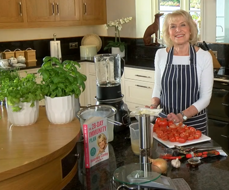 Rosemary Conley preparing to cook in her kitchen