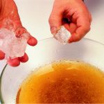 Add 6 ice cubes to help congeal the fat, then use a ladle to skim off any fat from the top of the bowl or pour into a gravy separator.
