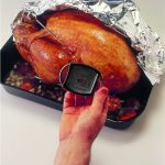 Once the turkey is cooked, test by using a meat thermometer or by inserting a skewer into the thickest part of the turkey through the thigh. The juices should run clear without traces of blood. If in any doubt return the turkey to the oven and cook for a further 30 minutes and test again. When done, the temperature should be above 75°C, 170°F.