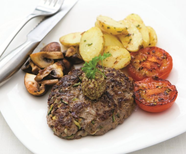 Minced Beef and Quorn Steaks are a homemade mix of meat and Quorn shaped into a burger and griddled, served here with grilled tomatoes, mushrooms and boiled new potatoes.