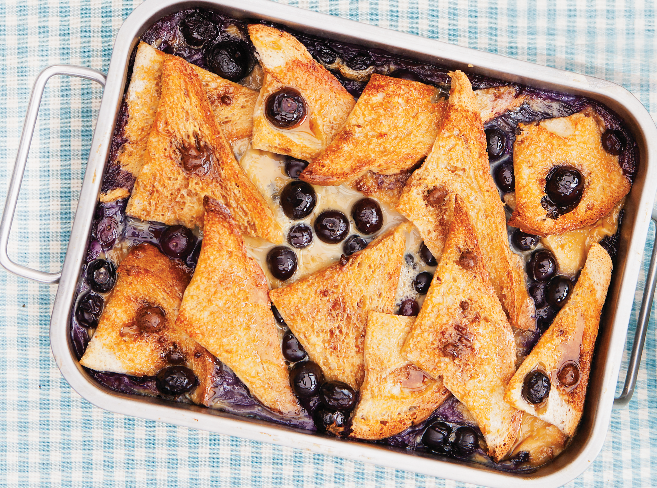 Blueberry Bread Pudding is a healthier version of the traditional pudding made using un-buttered triangles of bread smothered in a custard and blueberries