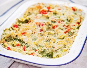 Cheese, Potato and Spinach Pie is baked in the oven giving a crispy golden top to the mix of cheese, mash and vegetables