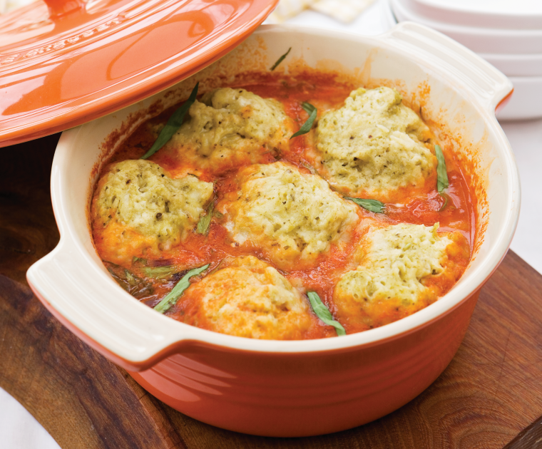 Chicken Stew with Tarragon Dumplings is a rich stew with a tomato based sauce with freshly made dumplings flavoured with tarragon nestling in the casserole dish