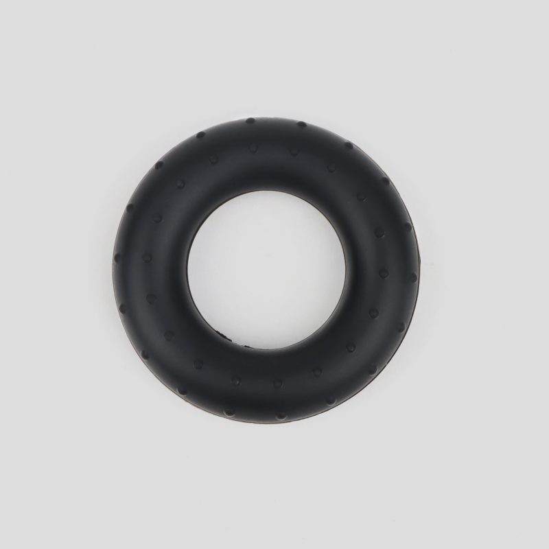 Part of the Hand Grip Strengthener 5 Piece Set, the Silicone Donut is a flexible doughnut-shaped grip trainer perfect for repetitive squeezing exercises to increase grip strength.