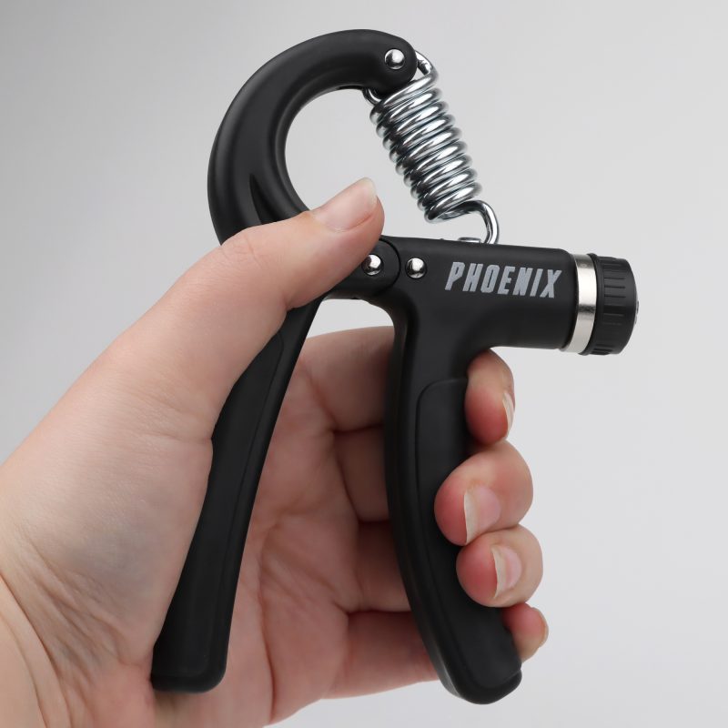 Hand Grip Strengthener in use in the left hand