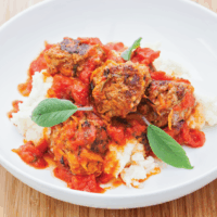 Pork, Carrot and Sage Meatballs are golfball sized meatballs made with added grated vegetables so they contain less meat. The recipe also includes a tasty sauce made with tomatoes, garlic and honey.