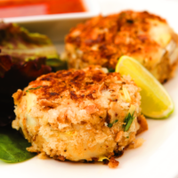 Smoked Mackerel Fishcakes served with lettuce and a lemon wedge
