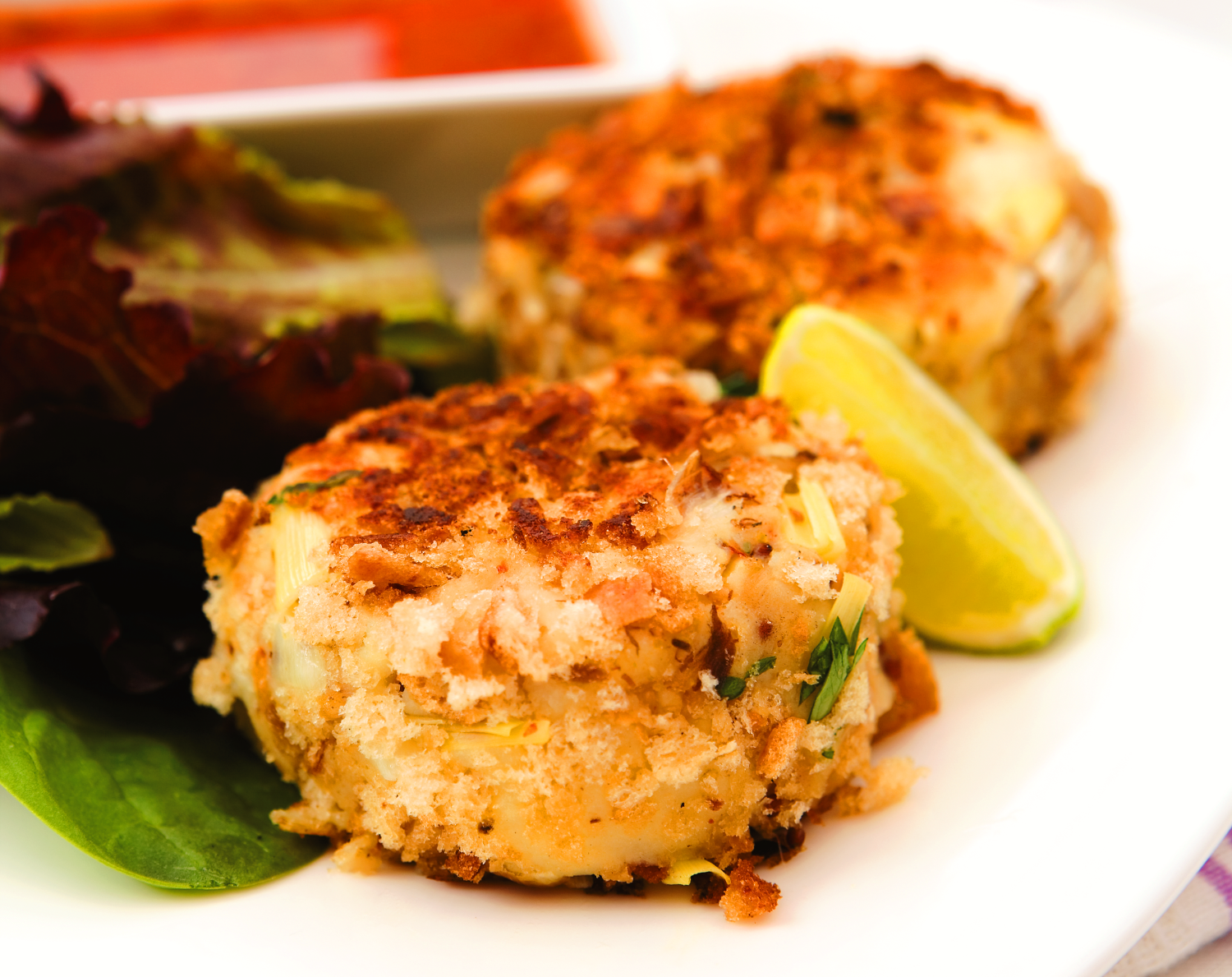 Smoked Mackerel Fishcakes served with lettuce and a lemon wedge