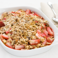 Strawberry and Rhubarb Muesli Crumble is a delicious dessert full of chopped strawberries and rhubarb topped with a crumble topping made with muesli and baked crisp.